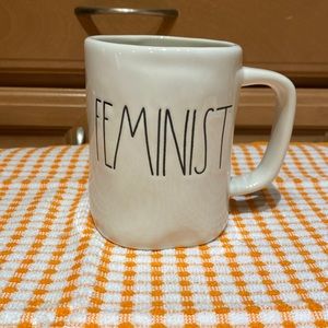 Rae Dunn mug with “Feminist” text